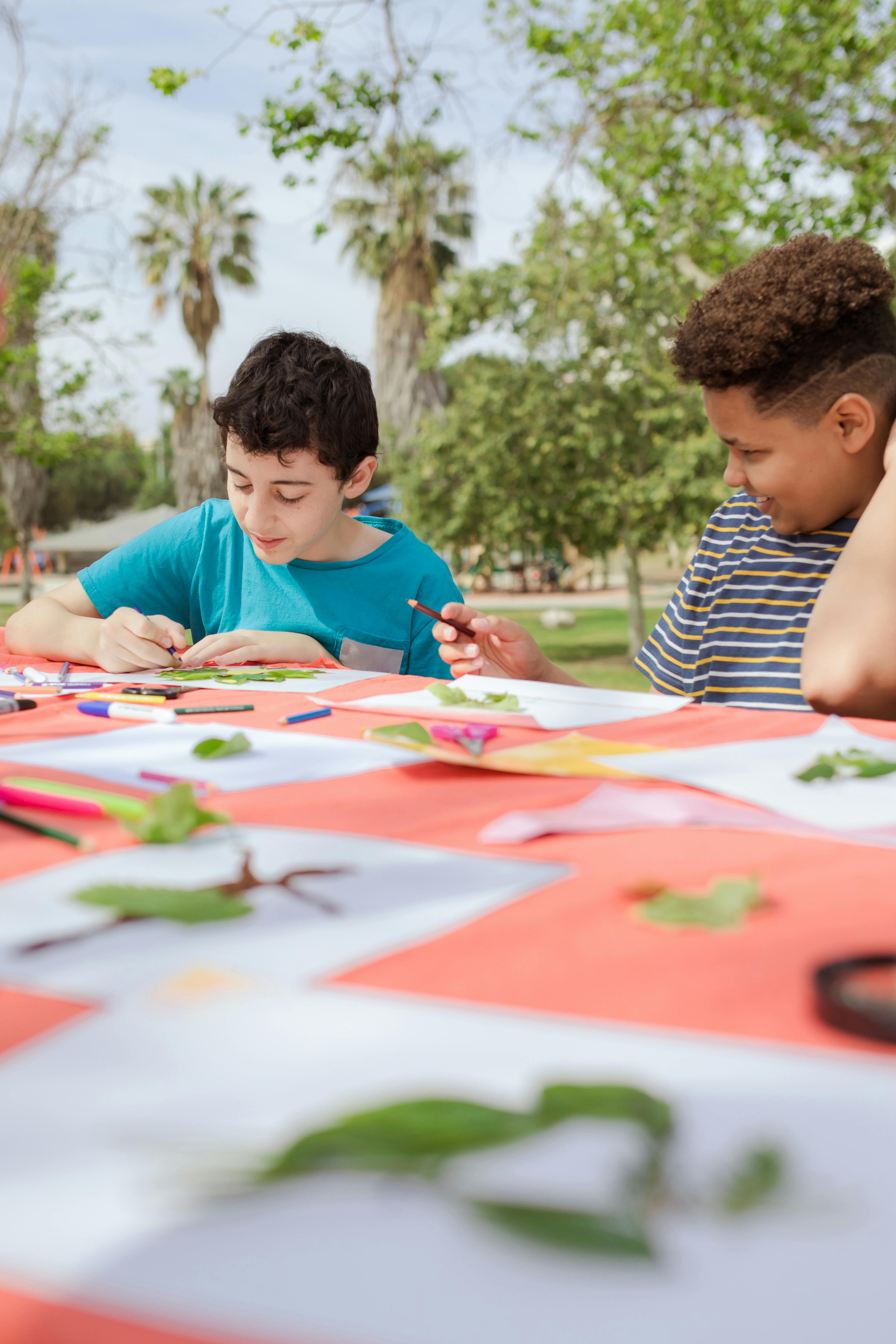 Children doing outdoor arts and crafts